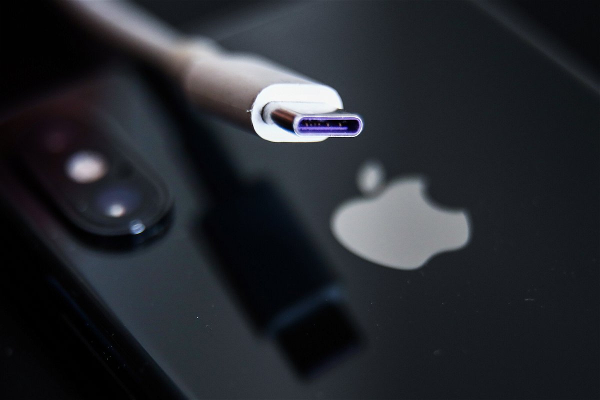 <i>Jakub Porzycki/NurPhoto/Getty Images</i><br/>USB-C cable and Apple logo on iPhone are seen in this photo taken in Krakow