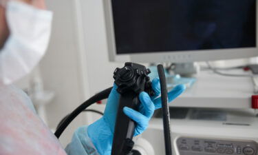 A new study questions the effectiveness of colonoscopies for cancer screening. Pictured is an endoscopist with an endoscope in his hands.