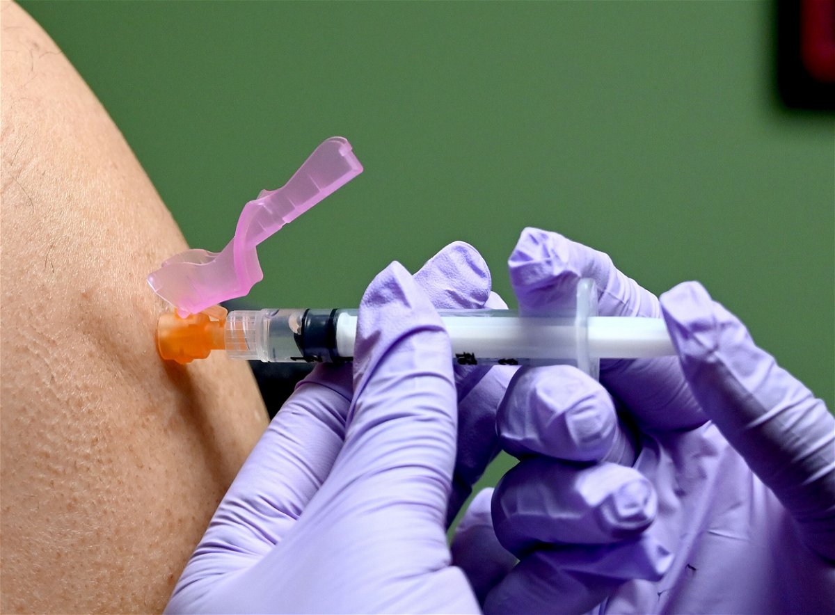 <i>Eva Hambach/AFP/Getty Images</i><br/>A man gets a flu shot at a health facility in Washington