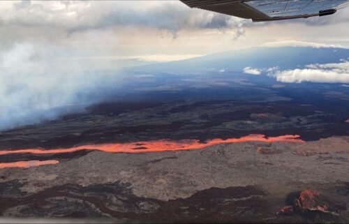 USGS posted two photos on Monday from a Civil Air Patrol flight which shows the Mauna Loa volcano erupting from vents on the Northeast Rift zone. Flows are moving downslope to the north.