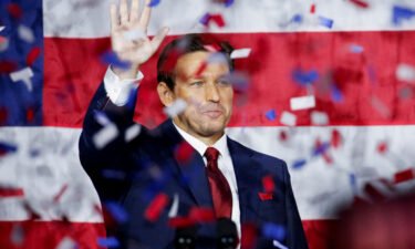 Republican Florida Governor Ron DeSantis celebrates onstage during his 2022 midterm elections night party in Tampa