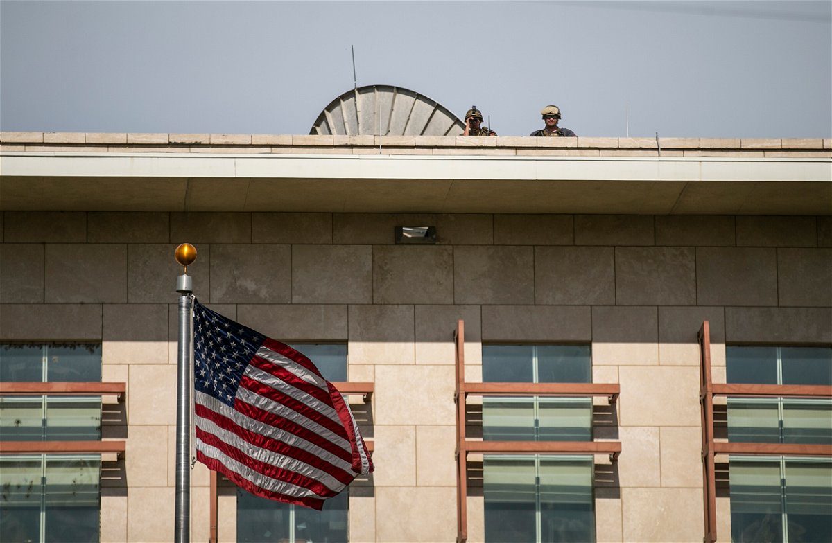 <i>Odelyn Joseph/AP/FILE</i><br/>US soldiers stand guard on the roof of the US Embassy in Port-au-Prince