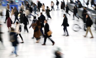The number of available jobs in the US fell in October. Commuters arrive into the Oculus station and mall in Manhattan on November 17