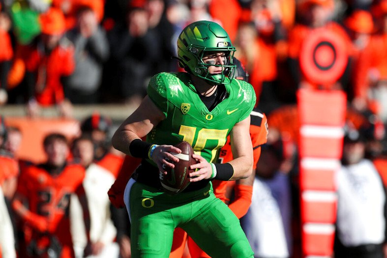 Oregon quarterback Bo Nix drops back to pass against Oregon State during the first half of the Nov. 15 game against in-state rival Oregon State