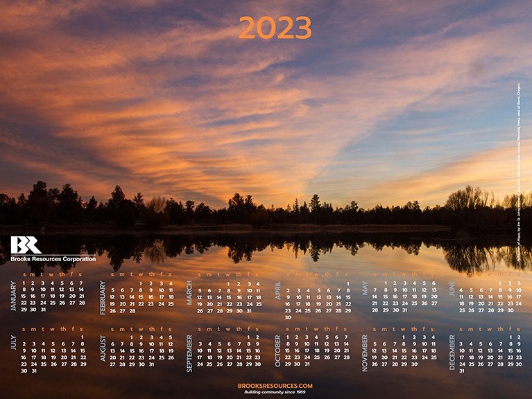 Jim St. John's photo of a Reynolds Pond sunrise is featured in Brooks Resources' 2023 wall calendar, now available