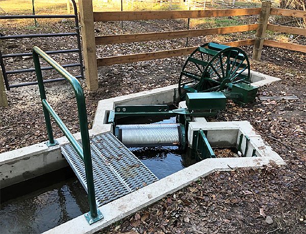 Example of a paddle-wheel-driven drum fish screen. ODFW's Fish Screening Program helps water users install and maintain fish screens to prevent fish from entering the more than 55,000 surface water diversions in Oregon