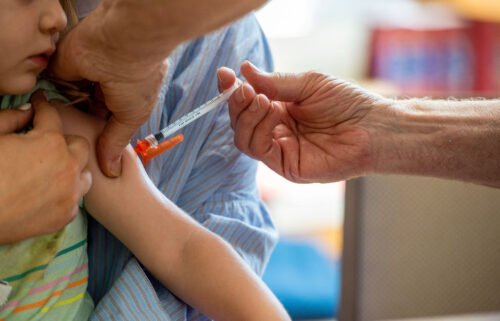 Children as young as 6 months can now receive an updated Covid-19 vaccine. A young child receives the Covid-19 vaccine in Needham