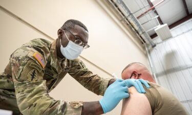 The House voted on Thursday to pass the defense bill that rescinds the US military's Covid-19 vaccine mandate. A soldier is here getting the Covid vaccine in September 2021 in Fort Knox