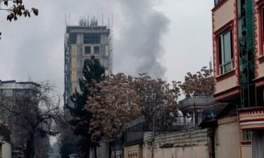 Smoke rises from the site of an attack in Shahr-e-naw