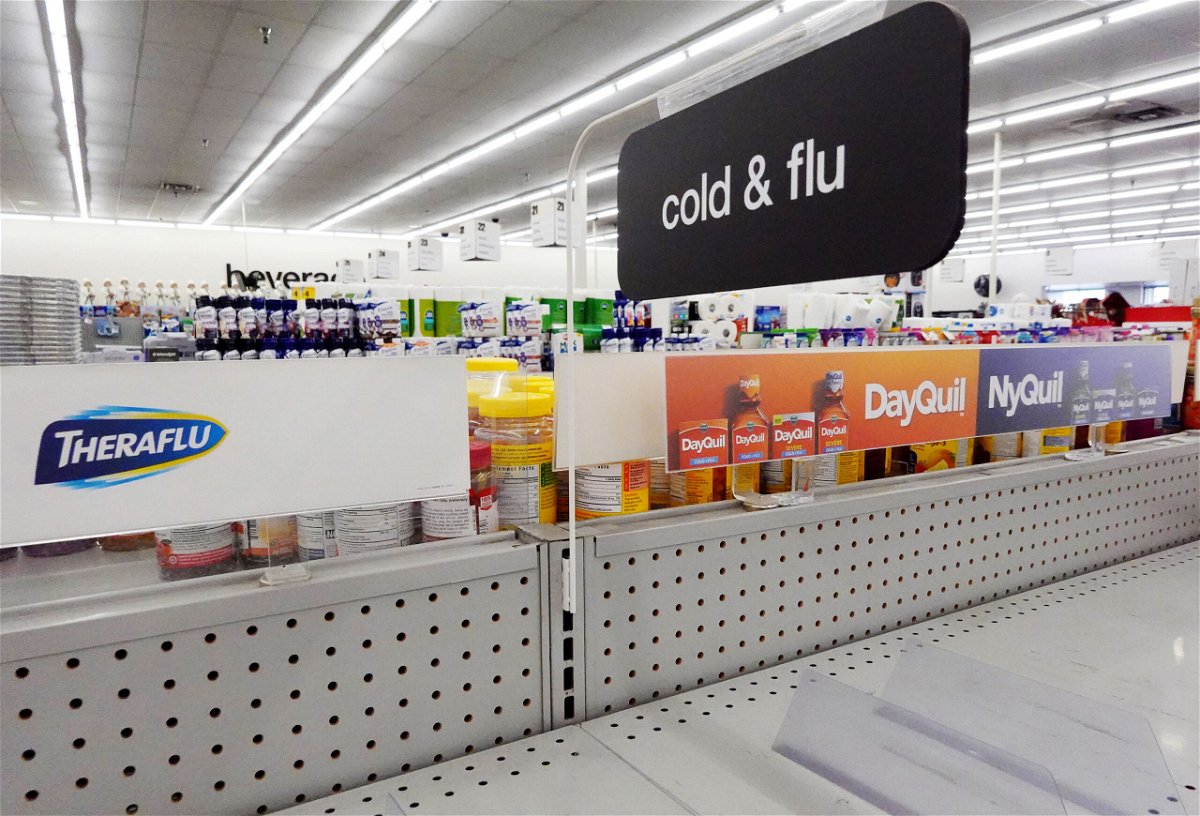 <i>Mario Tama/Getty Images</i><br/>A cold and flu medicine shelf is empty in a CVS pharmacy on December 6