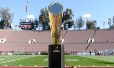 The College Football Playoff will expand from four to 12 teams starting with the 2024-2025 season. The National Championship Trophy is pictured on January 1