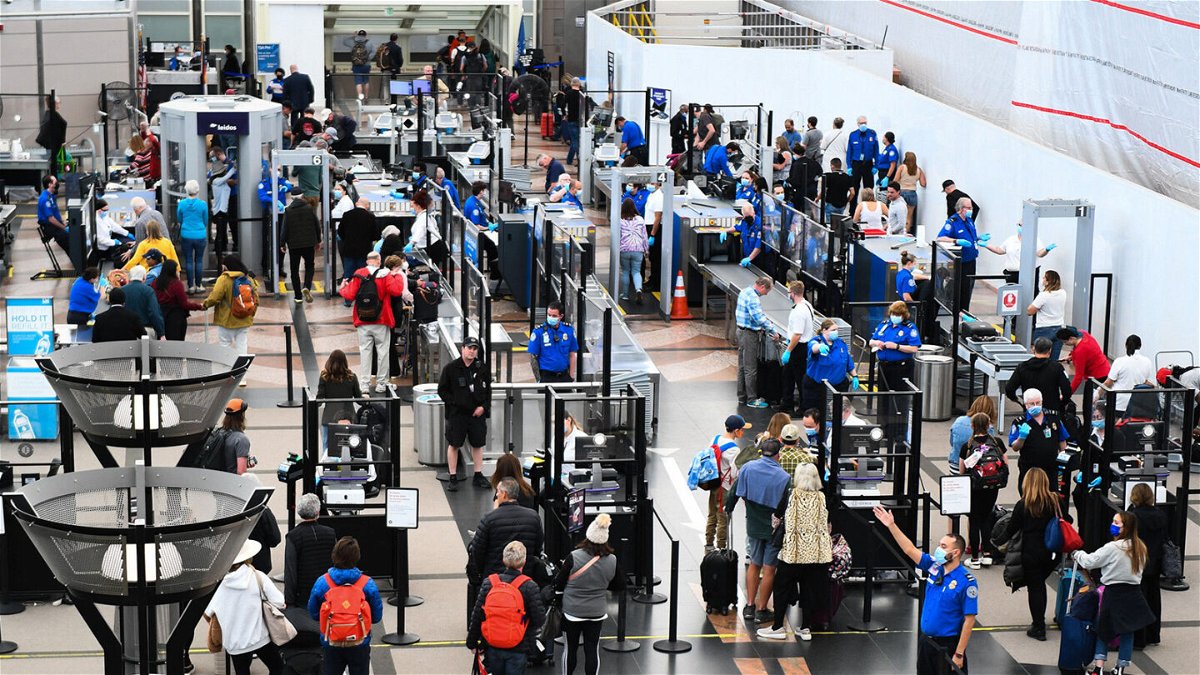 <i>Patrick T. Fallon/AFP/Getty Images</i><br/>The deadline for REAL ID has been extended. Airline passengers here wait at a Transportation Security Administration (TSA) checkpoint to clear security before boarding flights in Denver