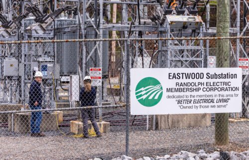Workers with Randolph Electric Membership Corporation work Tuesday to repair the Eastwood Substation in West End