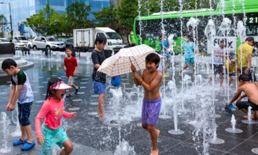 South Korea passed a new law on Thursday that aims to standardize how age is calculated in the country. Children play in Gwanghwamun Square in Seoul