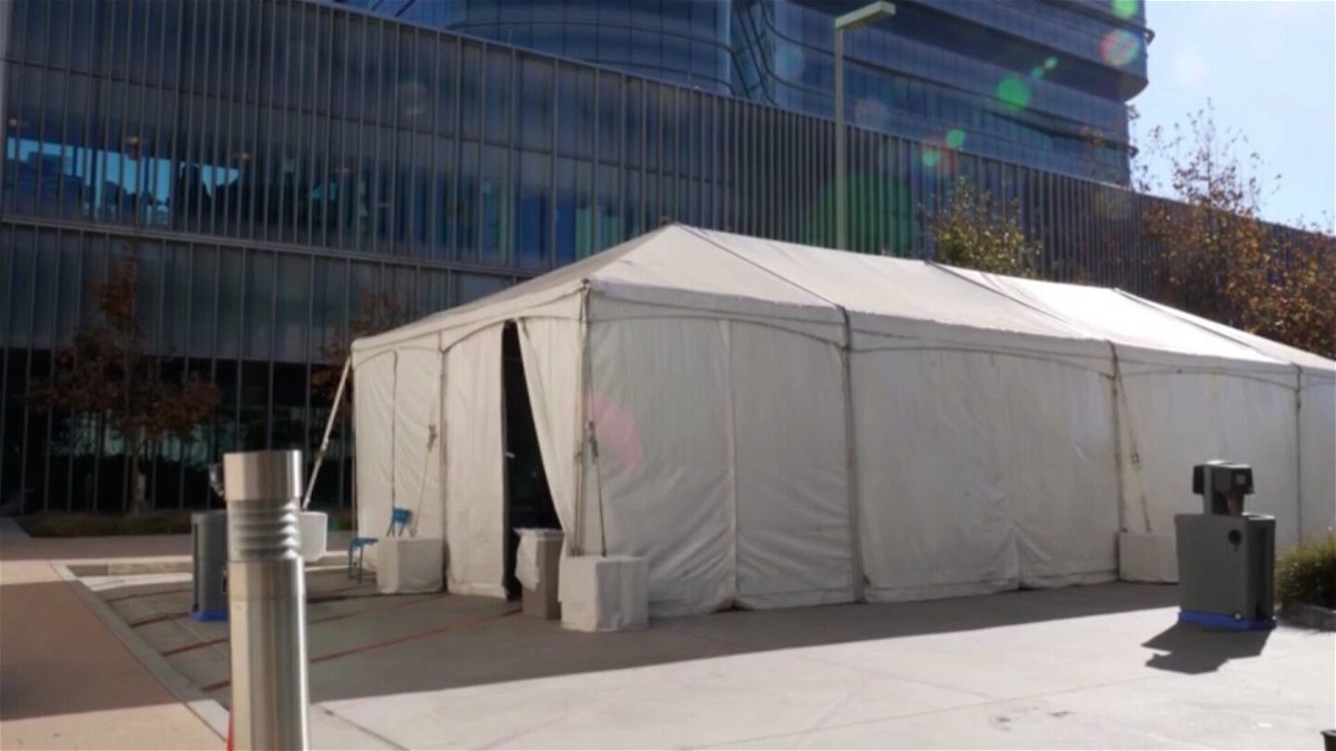 <i>From UC San Diego Health</i><br/>UC San Diego Health tents are setup in parking lots to triage patients. Dr. Christopher Longhurst