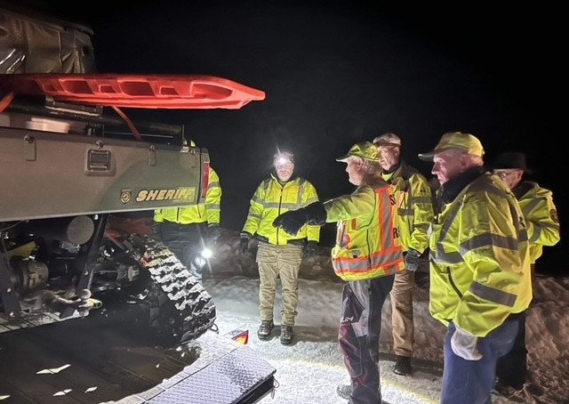 Crook County Sheriff's Search and Rescue with tracked vehicle on rescue of stranded motorist