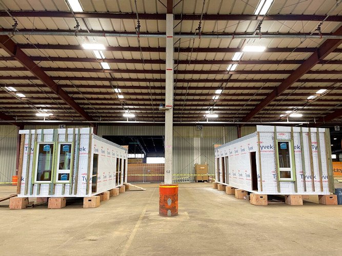 Mass timber affordable home prototypes are shown at the Port of Portland in Portland, Ore. Friday, Jan. 27, 2023. The prototype was built in a warehouse at the port. The Oregon Mass Timber Coalition aims to open a factory at the site that could mass produce homes and potentially alleviate the state's housing shortage.