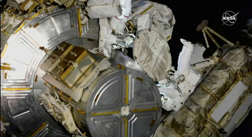 Astronauts NASA's Nicole Mann and Japan's Koichi Wakata venture out on a spacewalk at the International Space Station on Friday