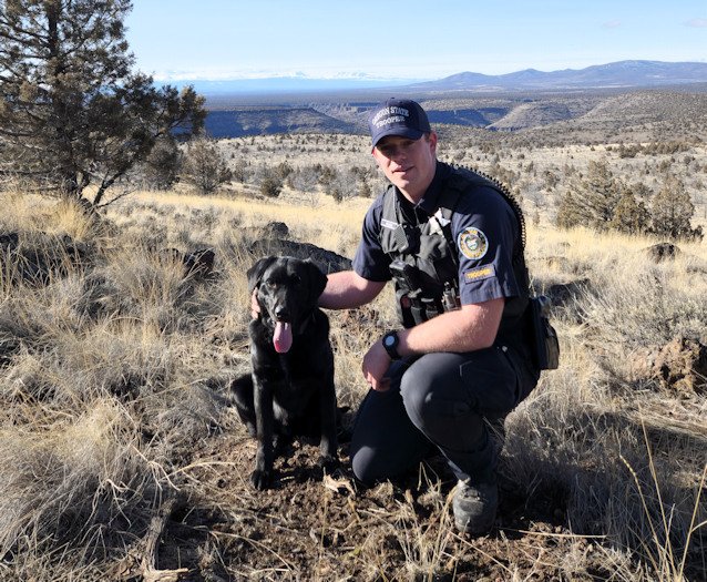 OSP Fish & Wildlife Trooper Shae Ross and his anti-poaching K-9 partner, Scout