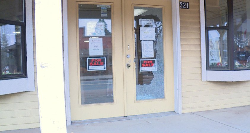 Damage was evidence to front door of downtown Sisters bookstore after break-in
