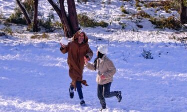People play in the snow in Algeria's Constantine province
