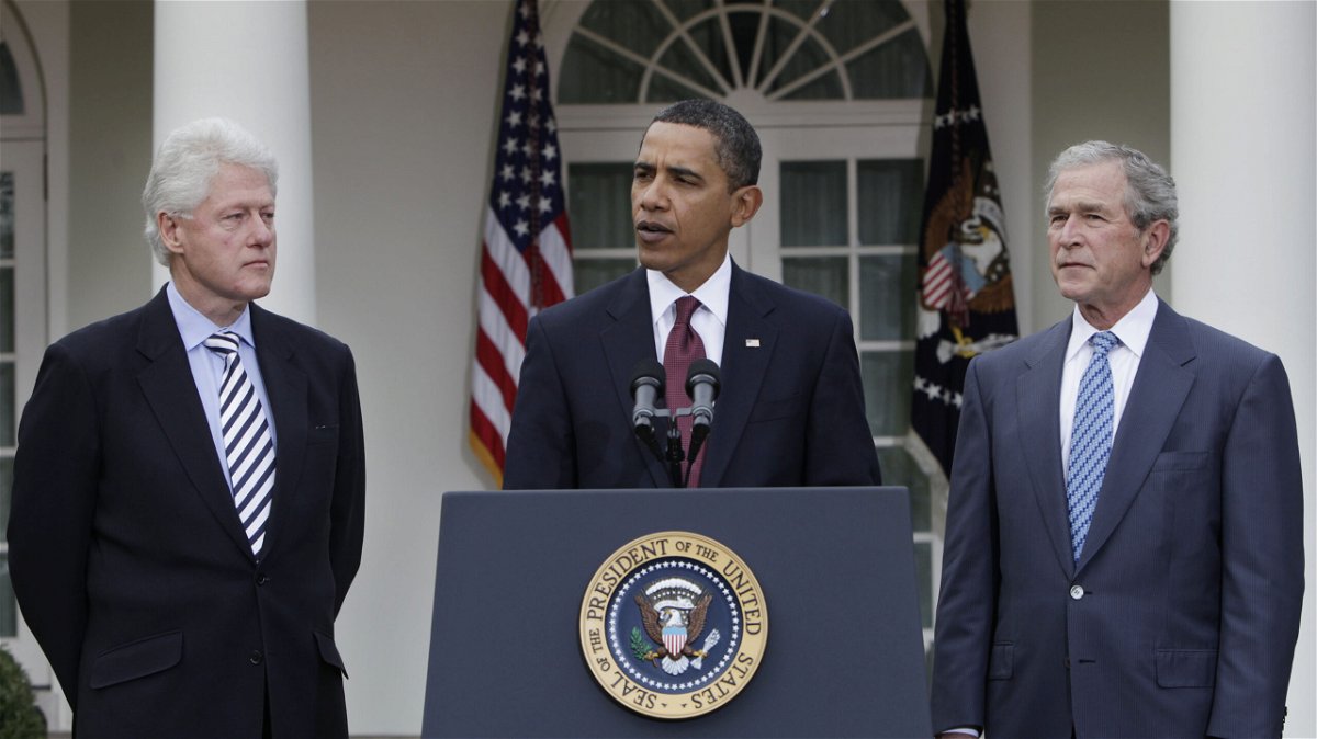 <i>Pablo Martinez Monsivais/AP</i><br/>President Barack Obama (center) speaks as former Presidents Bill Clinton (left) and George W. Bush (right) listen in the Rose Garden at the White House in January of 2010.