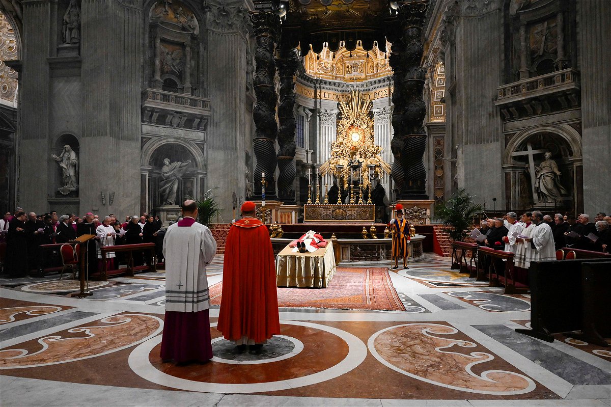 <i>Vatican Media/Reuters</i><br/>Benedict's lying-in-state started Monday in St. Peter's Basilica.