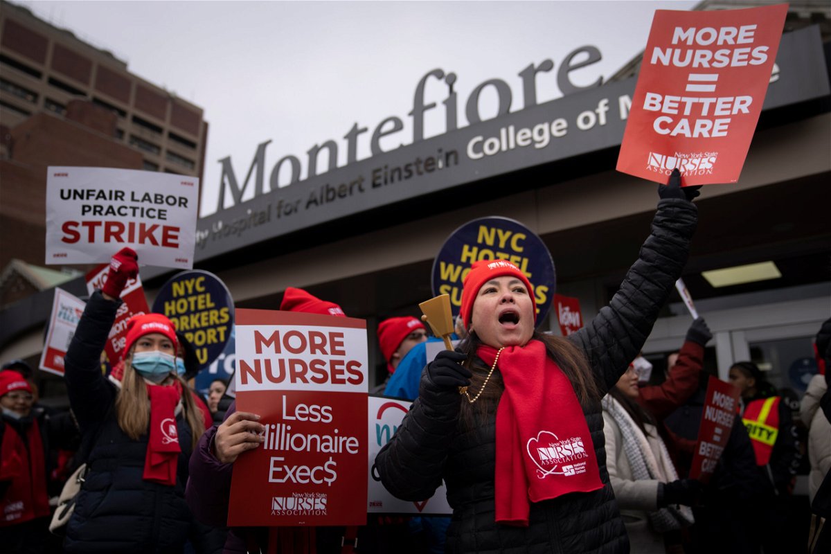 <i>John Minchillo/AP</i><br/>Protestors march on the streets around Montefiore Medical Center during a nursing strike on January 11 in the Bronx borough of New York.