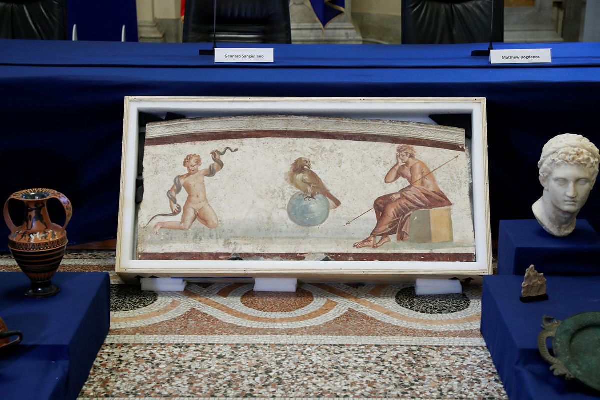 <i>Remo Casilli/Reuters</i><br/>A fresco from Pompeii is displayed in Rome on January 23