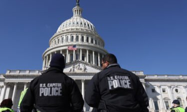 US Capitol police officers gather on the east front plaza of the Capitol in February of 2022 in Washington
