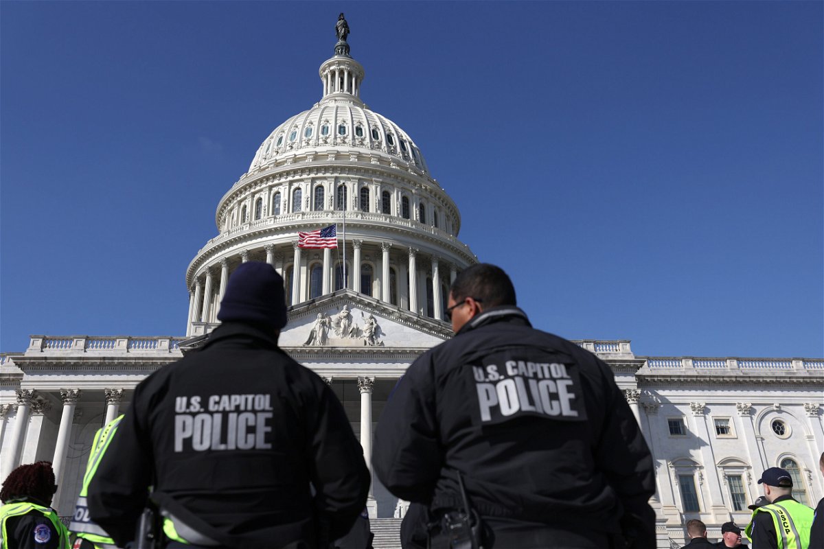 <i>Justin Sullivan/Getty Images</i><br/>US Capitol police officers gather on the east front plaza of the Capitol in February of 2022 in Washington