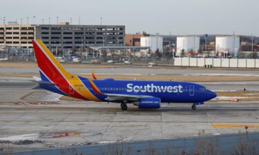 A Southwest Airlines passenger jet lands at Chicago Midway International Airport in Chicago