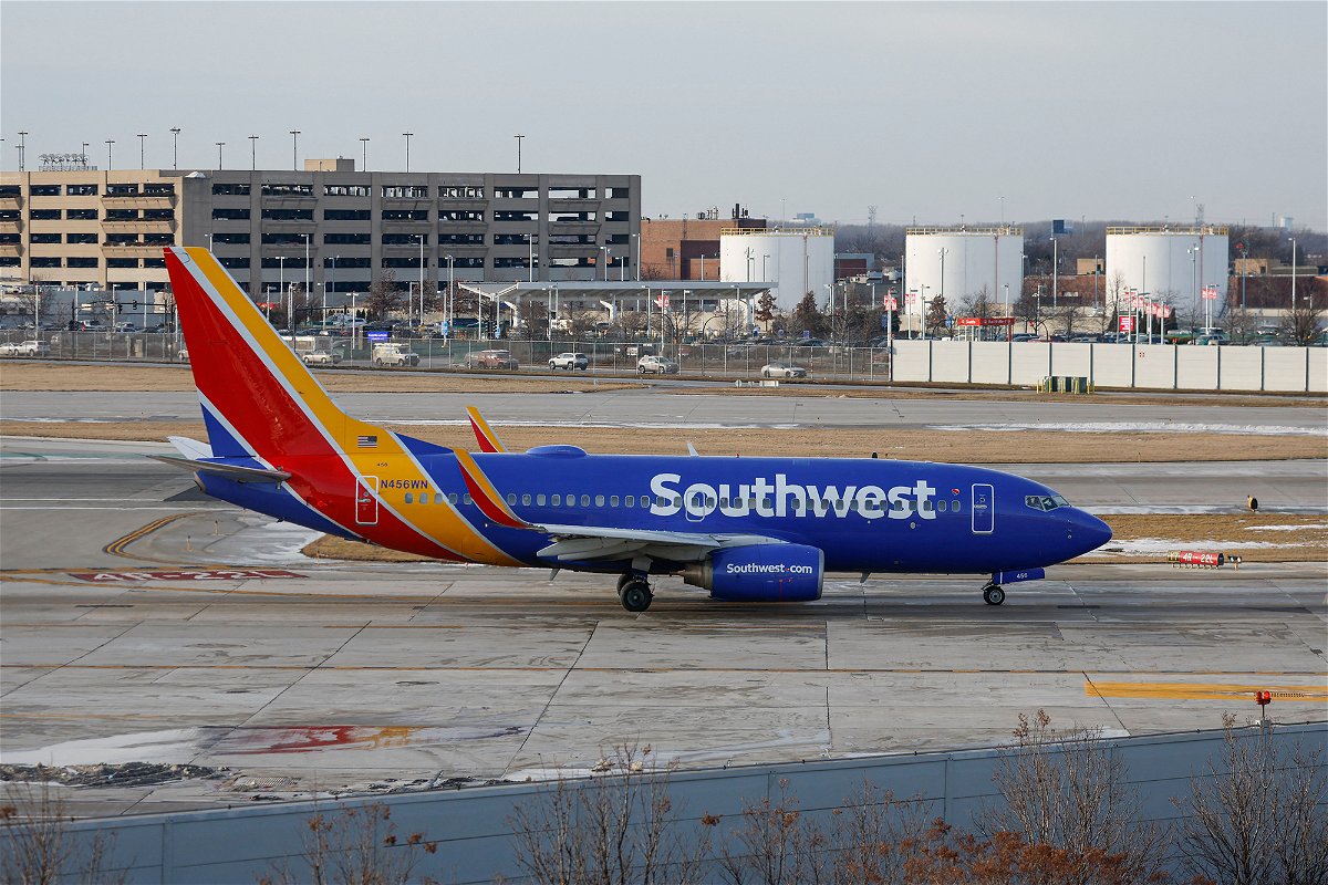 <i>Kamil Krzaczynski/AFP/Getty Images</i><br/>A Southwest Airlines passenger jet lands at Chicago Midway International Airport in Chicago