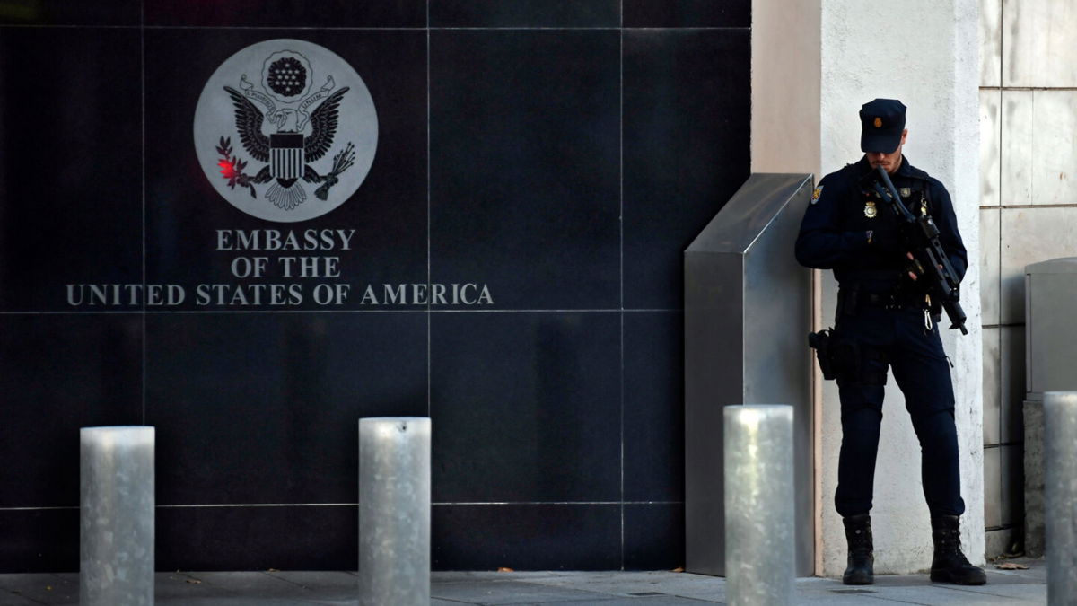<i>Oscar Del Pozo/AFP/Getty Images</i><br/>A Spanish policeman stands guard near the US embassy in Madrid