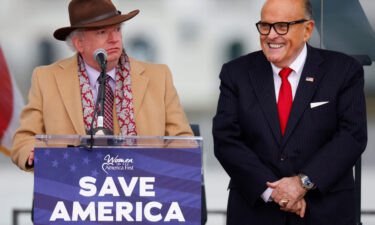 John Eastman (left) stands next to Rudy Giuliani as Trump supporters gather at the U.S. Capitol ahead of the former president's speech to contest the certification by Congress of the results of the 2020 election on January 6