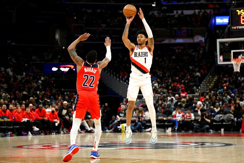 Portland Trail Blazers guard Anfernee Simons (1) shoots against Washington Wizards guard Monte Morris (22) during the second half of Friday night's game in Washington.