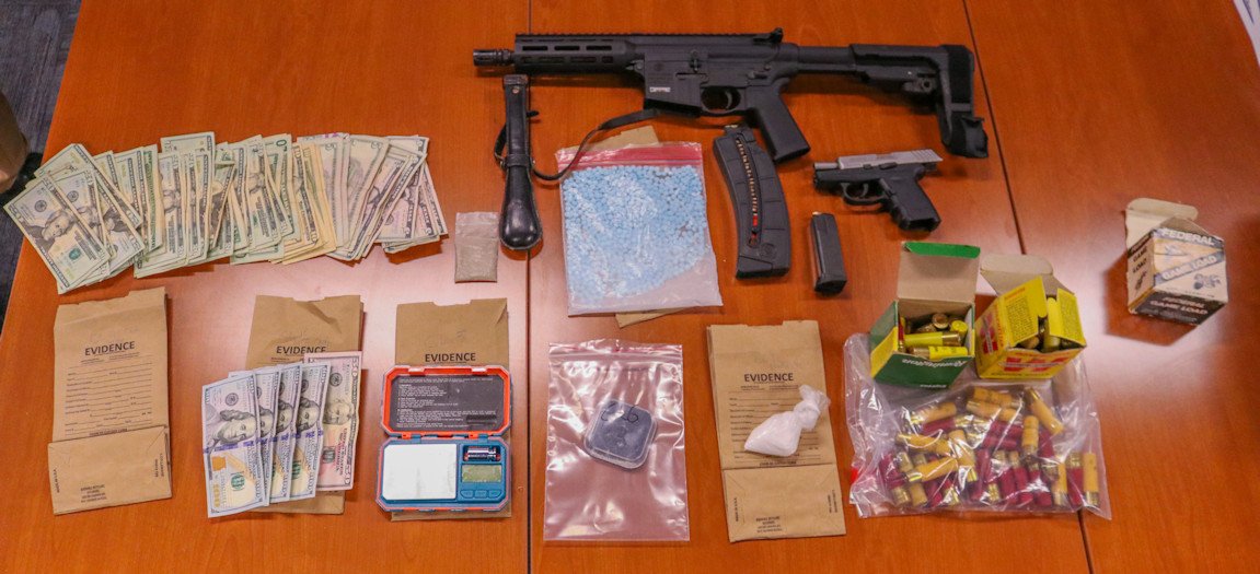Deschutes County Sheriff's Office Street Crimes Unit displayed drugs, cash, weapons seized in raid Thursday on Hunnell Road RV