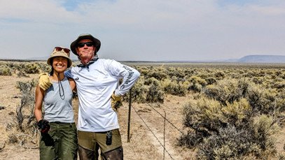 94 degrees, covered in dust and still smiling—ONDA volunteers Jeff Noel and Yichin Flora Chiu know the secret to happiness