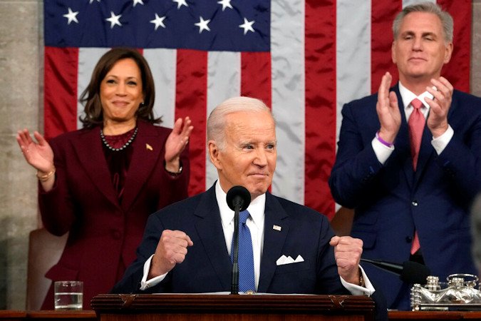 President Joe Biden delivers the State of the Union address to a joint session of Congress  Tuesday night as Vice President Kamala Harris and House Speaker Kevin McCarthy of Calif., applaud. 