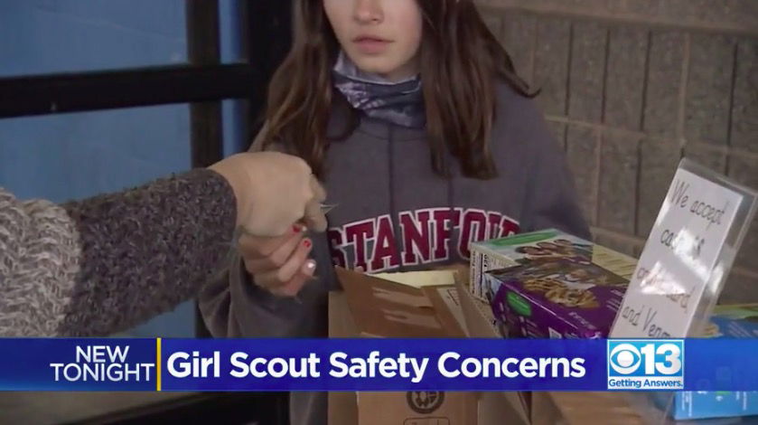 <i>KOVR</i><br/>A Girl Scout is handed money for cookies at a pop-up booth at Granite Bay. The troop leader said