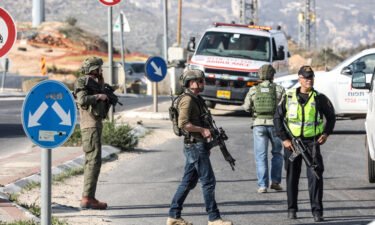 Israeli security forces close the road and search for a shooter following a shooting attack in Hawara area.