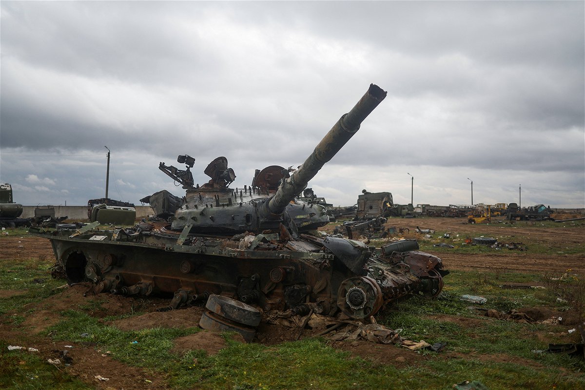 <i>Valentyn Ogirenko/Reuters</i><br/>A destroyed Russian tank is pictured after Russia's retreat from Kherson