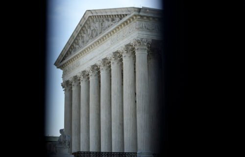 The US Supreme Court is seen here through security fencing in May 2022 in Washington