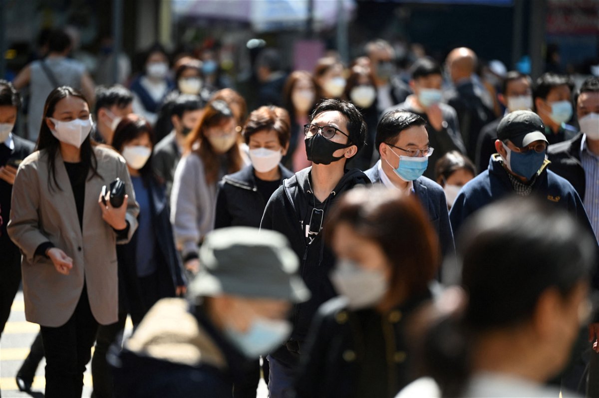 <i>Peter Parks/AFP/Getty Images</i><br/>People wear masks on a street in Hong Kong on February 27.