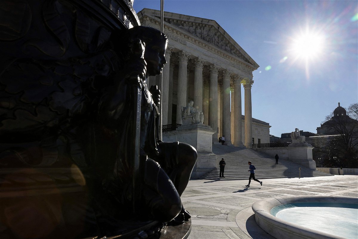 <i>Oliver Contreras/AFP/Getty Images</i><br/>The Supreme Court on Thursday removed oral arguments over Title 42 immigration policy from its calendar.