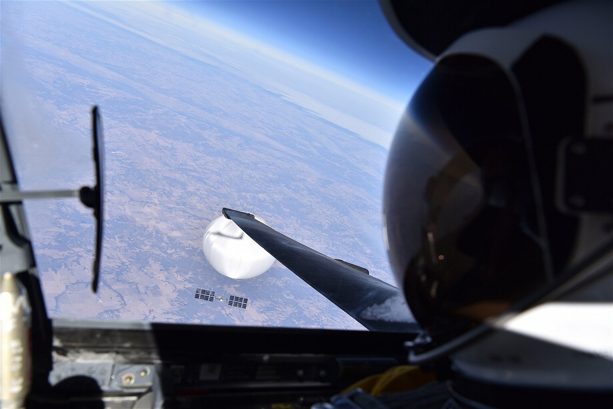 <i>US Department of Defense</i><br/>A US Air Force pilot looked down at the suspected Chinese surveillance balloon as it hovered over the Central Continental United States on February 3. Recovery efforts began shortly after the balloon was downed.