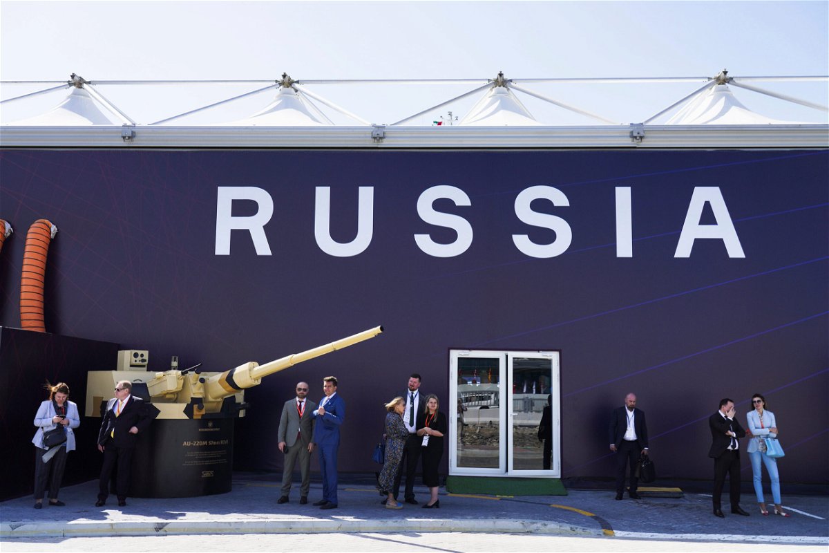 <i>Jon Gambrell/AP</i><br/>Russian salespeople stand by a tent for Russian weapons manufacturers at the International Defense Exhibition and Conference in Abu Dhabi