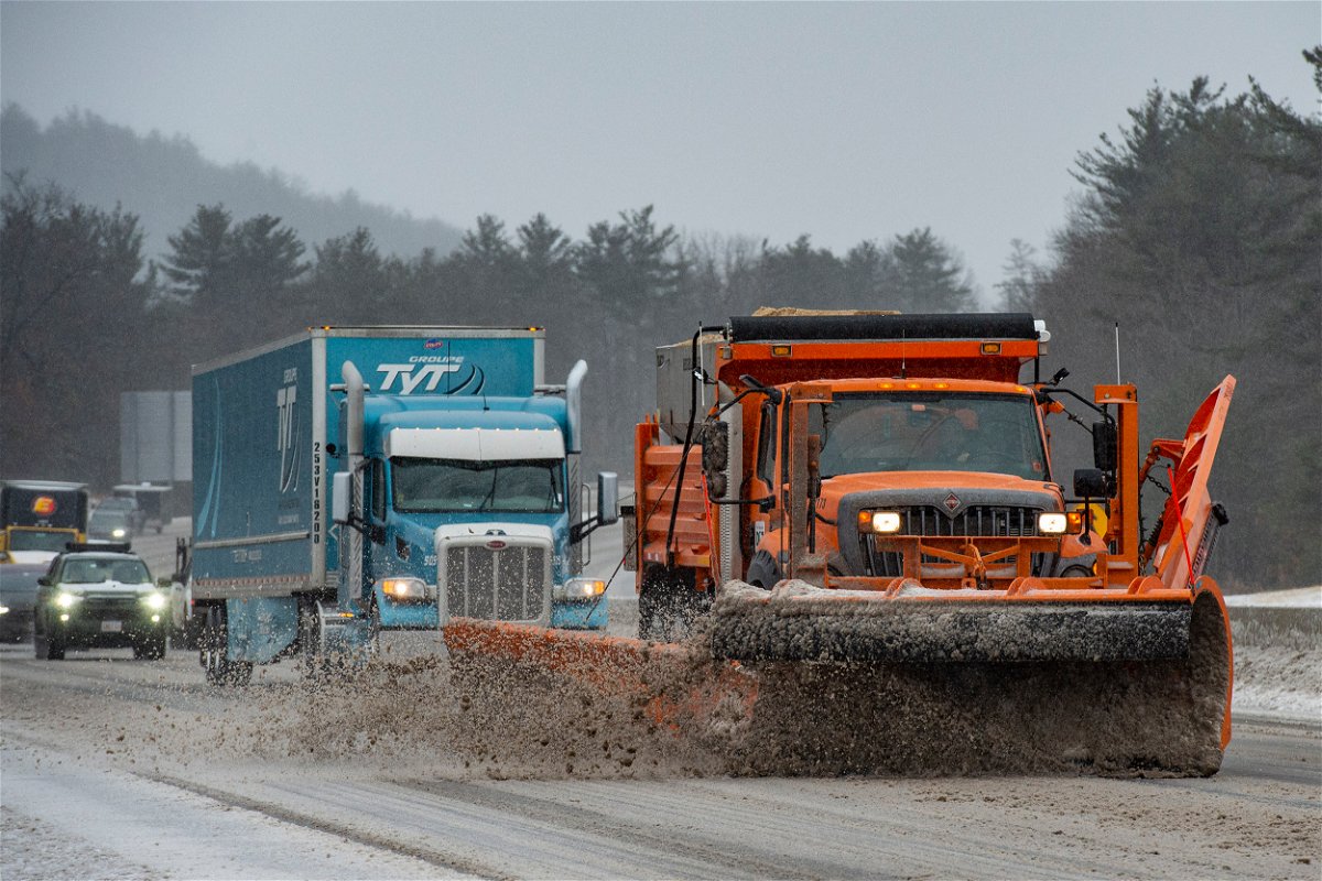 <i>Joseph Prezioso/AFP/Getty Images</i><br/>Snow plows trucks clear snow and ice from Interstate highway 93 during a winter storm in Hooksett