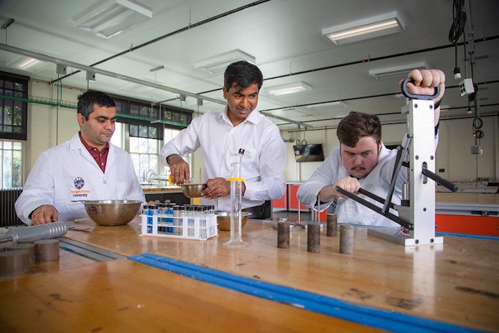 Pavan Akula, center, assistant professor of civil engineering in the OSU College of Engineering, and students Ashish Bastola, left, and Nicholas Petersen in Akula's lab