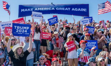 Supporters cheer ahead of former President Donald Trump's speech at the Waco Regional Airport on March 25 in Waco